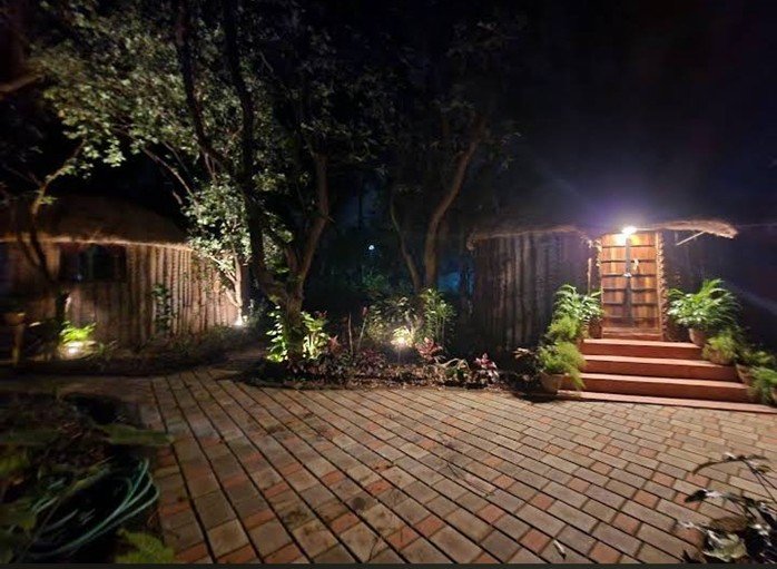 Rustic Hut Entrance at Night